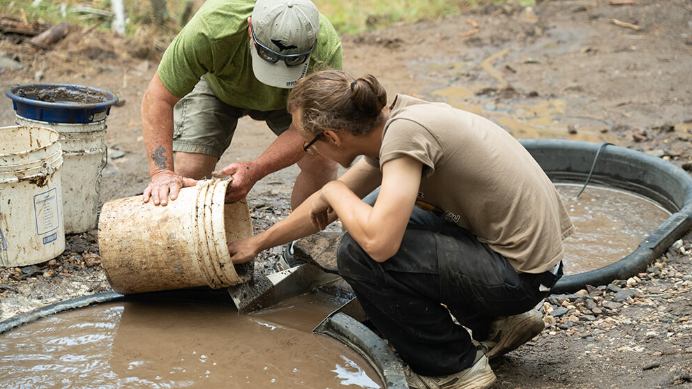 two friends gold panning