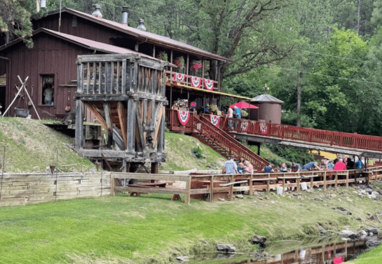 Historic Big Thunder Gold Mine building and outdoor gold panning in Keystone SD near Mount Rushmore.